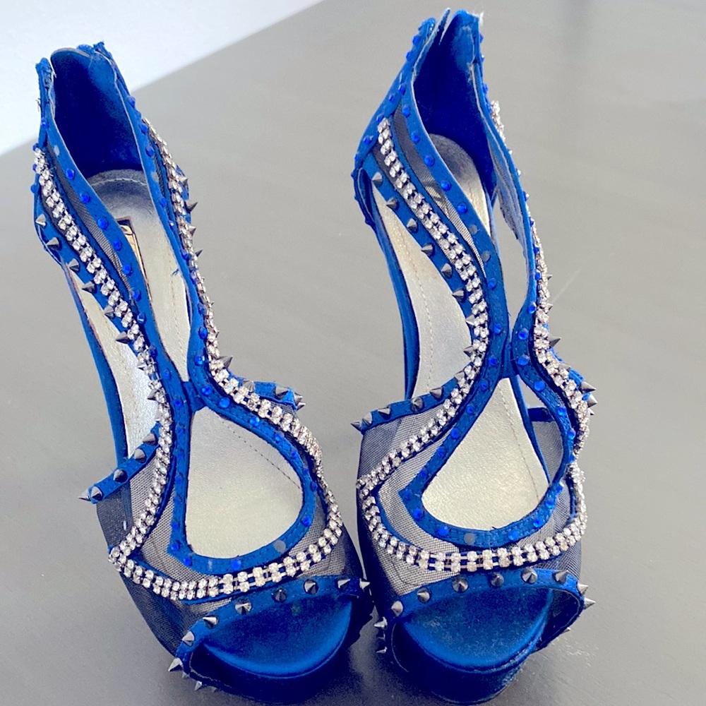 Blue studded high heels, like new. Only wore once.. some rhinestones are missing